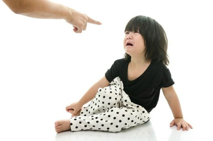 teacher scolding student